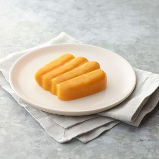 Thick and Easy Shaped Pureed Frozen carrots on a table