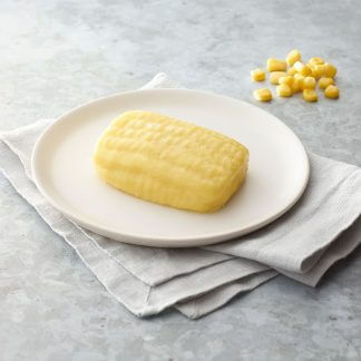 Thick and Easy Shaped Pureed Frozen corn on a table