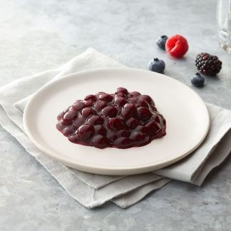 Thick and Easy Shaped Pureed Frozen mixed berries on a table